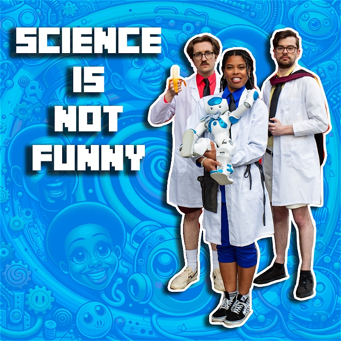 A cute humanoid robot is being held by a black female comedy scientist wearing a white lab coat over a bright blue short and trousers. She is accompanied by two other while male comedy scientists in lab coats. The caption reads 'science is not funny'.